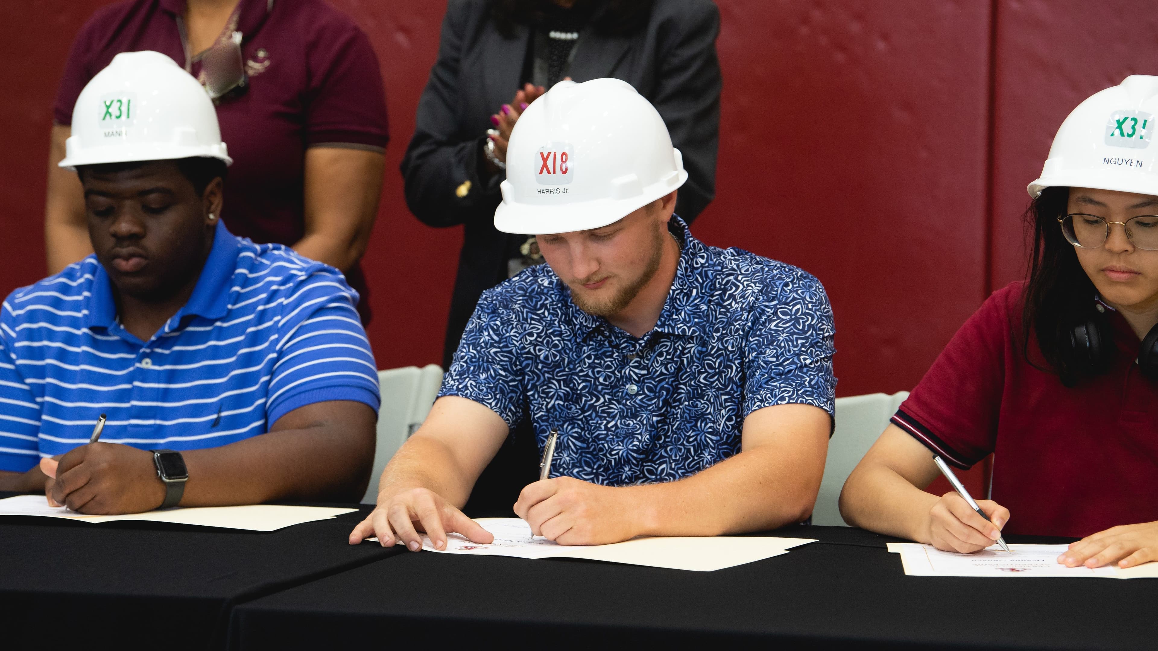 High School Seniors Sign for Careers at HII’s Newport News Shipbuilding